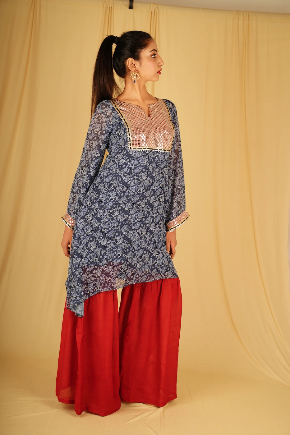 indigo-blue-and-white-floral-printed-chiffon-kurta-with-maroon-sequin-work-yolk-and-maroon-sharara-m?uid=1674969391