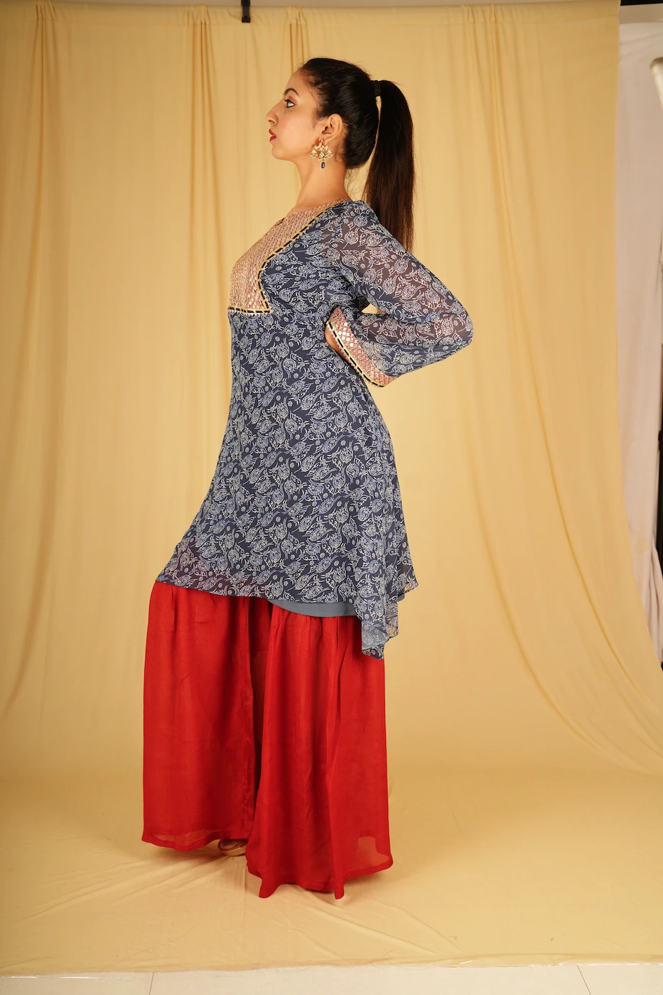 indigo-blue-and-white-floral-printed-chiffon-kurta-with-maroon-sequin-work-yolk-and-maroon-sharara-m?uid=1674969391