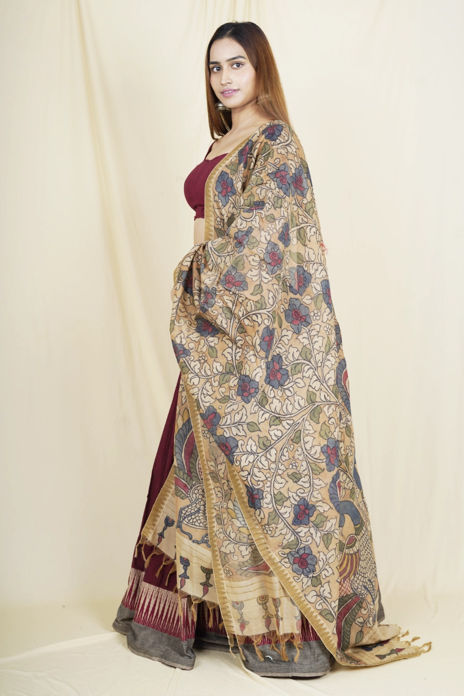 maroon-mangalagiri-cotton-lehenga-with-brown-temple-border-paired-with-matching-blouse-and-brown-pen-kalamkari-dupatta-s?uid=1675052096