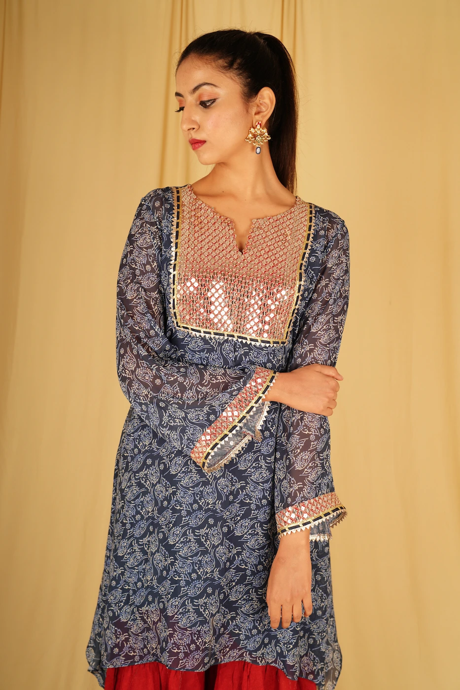 indigo-blue-and-white-floral-printed-chiffon-kurta-with-maroon-sequin-work-yolk-and-maroon-sharara-m?uid=1674969391
